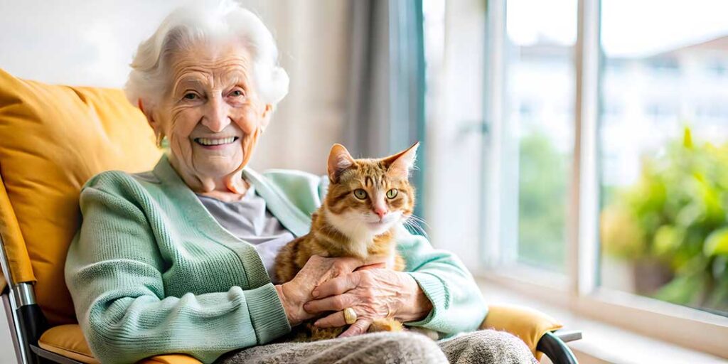Older adult and family member reviewing assisted living fees at a kitchen table with papers and a calculator.